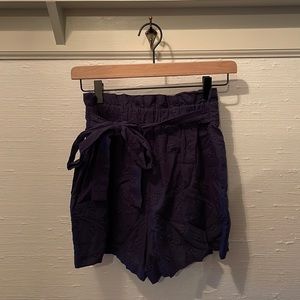 New with Tags!!! Francesca’s size S navy shorts.